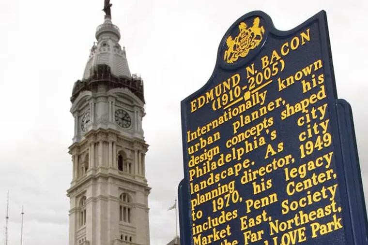 A state historical marker honoring the late city planner Edmund Bacon is shown Wednesday, Sept. 13, 2006, after its  unveiling at John F. Kennedy Plaza, also called "Love Park," in Philadelphia. Behind the marker is City Hall. (AP Photo/George Widman)
