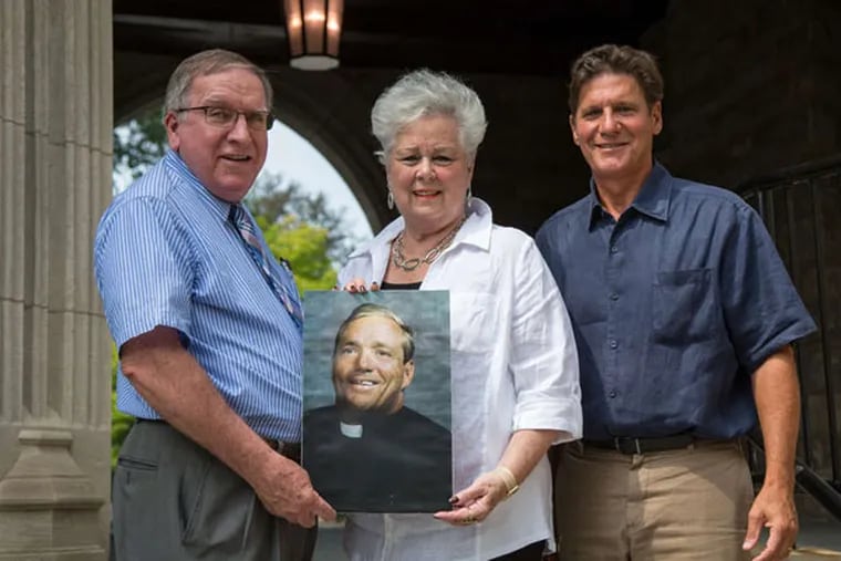 Seeking canonization for the Rev. William Atkinson, who was left quadriplegic in a 1965 accident, are Richard Heron (left), Mary Connelly Moody, and Stephen McWilliams. (EMILY COHEN / For The Inquirer)