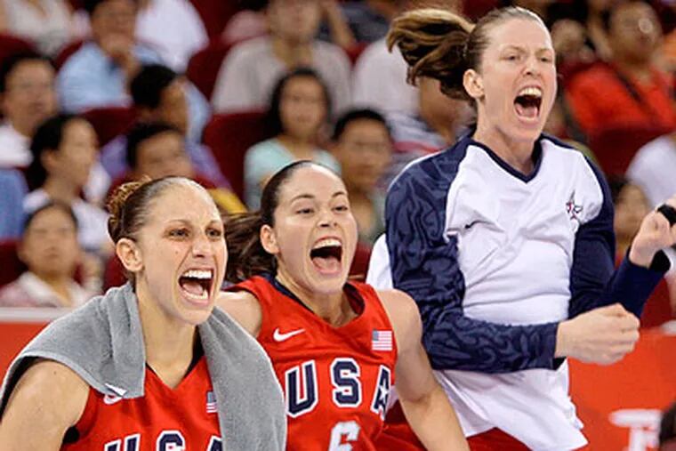 Diana Taurasi, Sue Bird and Katie Smith celebrate during the gold medal game at the 2008 Olympics in Beijing.