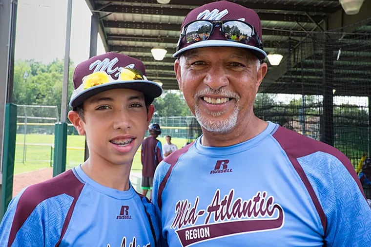 Jared Sprague-Lott and his dad/coach Leland Lott. (Ed Hille/Staff Photographer)