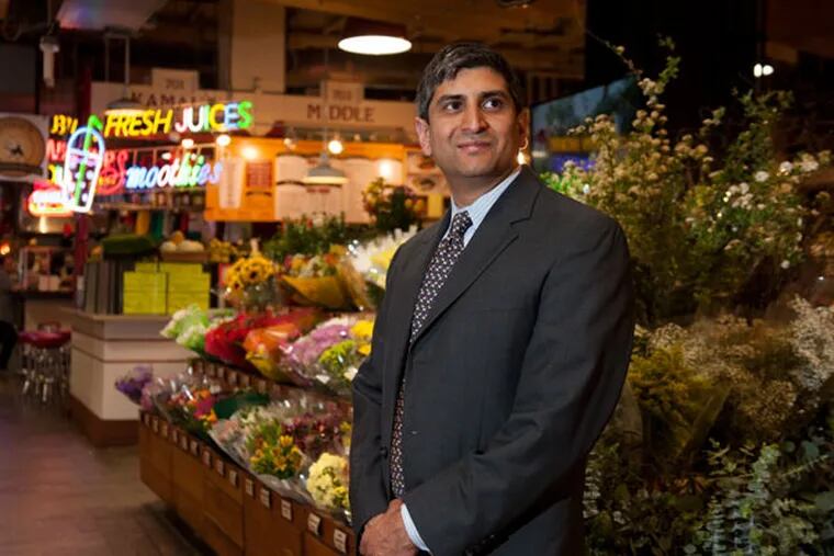 Anuj Gupta takes his extensive public service experience to the realm of food as the new general manager of Reading Terminal Market, a place he wants to grow despite a lack of space and encroaching competition. (MICHAEL PRONZATO / Staff Photographer)