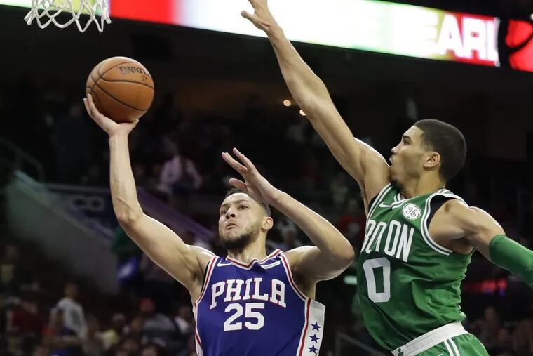 Sixers guard Ben Simmons putting up a shot against the Celtics’ Jayson Tatum during the teams’ October meeting.