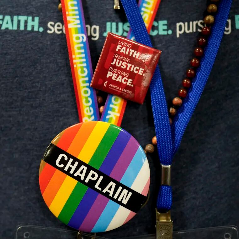 A convention-goer wears a button supporting LGBTQ clergy at the United Methodist Church General Conference last week, in Charlotte, N.C. United Methodist delegates repealed their church’s long-standing ban on LGBTQ clergy with no debate.