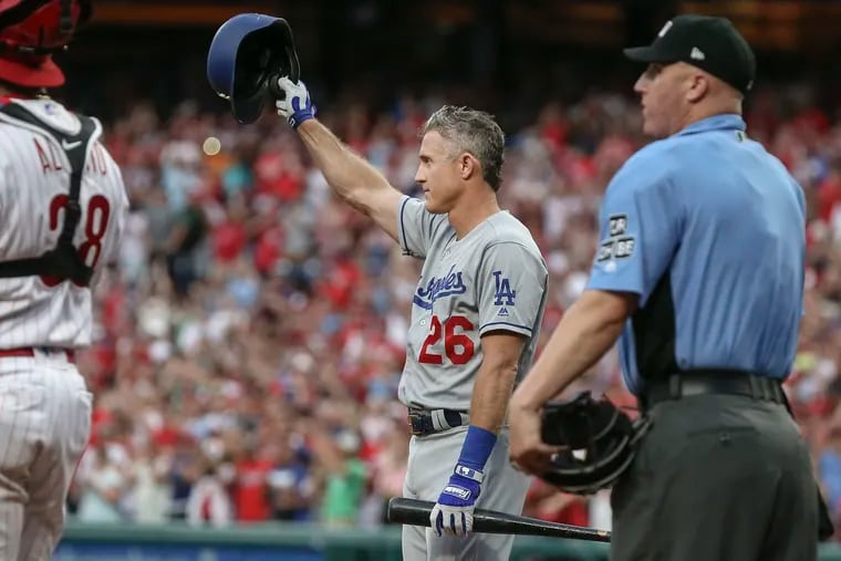 Chase Utley acknowledges the crowd before his at-bat in the second inning of Monday night's Phillies-Dodgers game.