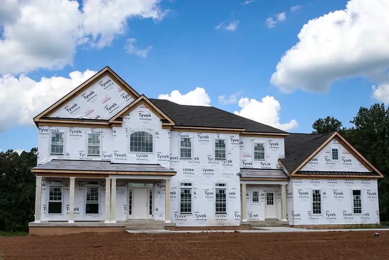 DeLuca Homes and other homebuilders are seeing an increase in orders for newly built houses as buyers face a low supply of existing homes for sale. This house is under construction at "the Estates at Creekside" in Ivyland.