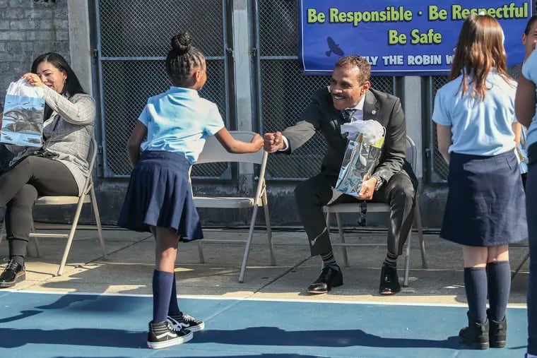 Philadelphia School District Superintendent Tony Watlington thanks a Richmond Elementary student at an October event at the school. Watlington's transition team presented its report Thursday, a roadmap for what Watlington will focus on in the next months and years.