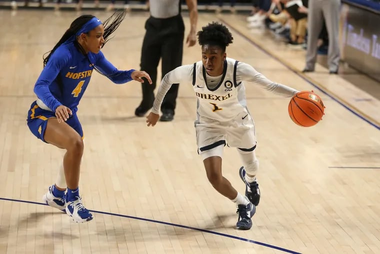 Keishana Washington (right) has been named as a semifinalist for the Becky Hammon Award, given to the best women's player at a mid-major in the nation.