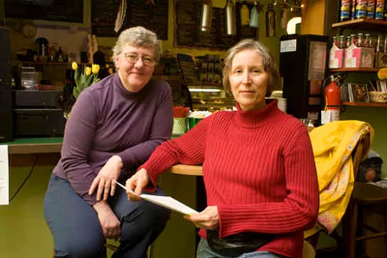 Sari Steuber (left) and Marion Yaglinski are in a group that made Media the first &quot;Transition Town&quot; in Pa. A TT seeks to relocalize and become more resilient as oil dwindles. (Ed Hille / Staff Photographer)