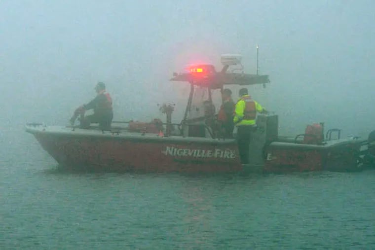 ASSOCIATED PRESSGrim mission A rescue boat is shrouded in fog near Navarre Beach, Fla., where an Army Black Hawk helicopter crashed Tuesday evening carrying 11 service members. Fighting the fog, it was still considered a search and rescue mission yesterday, although all aboard were presumed dead.