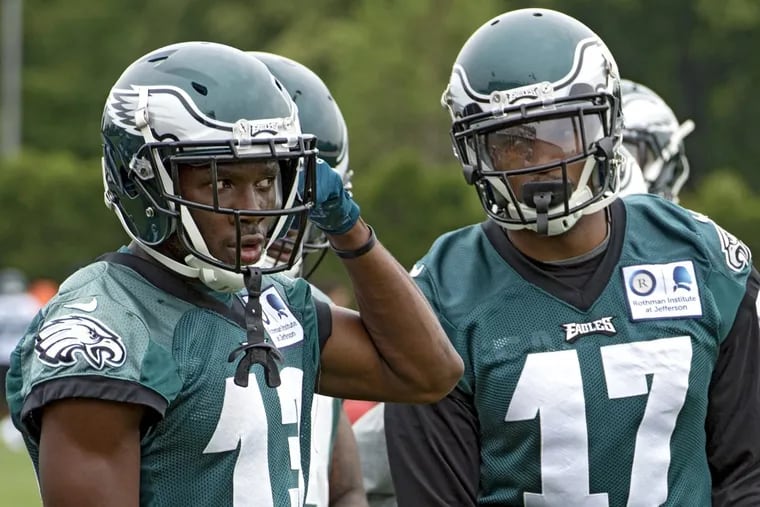 Eagles wide receivers Nelson Agholor (left) and Alshon Jeffery during OTAs on May 23.