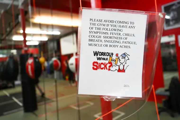 A sign hangs at Maleek Jackson Fitness Boxing Gym in the Northern Liberties neighborhood of Philadelphia on Wednesday, Oct. 21, 2020. Gyms and fitness studios were temporarily shuttered when Philly's latest safer-at-home restrictions went into effect Nov. 20, but should be set to reopen Jan. 4.