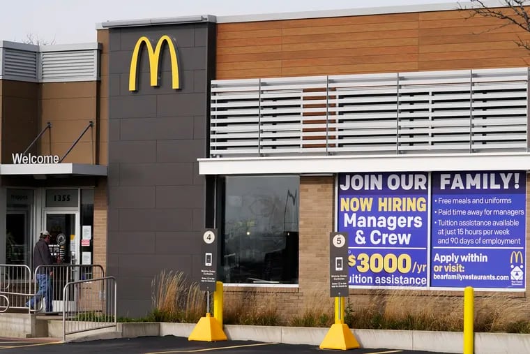 A hiring sign is displayed outside of a McDonald's in Buffalo Grove, Ill., last year.