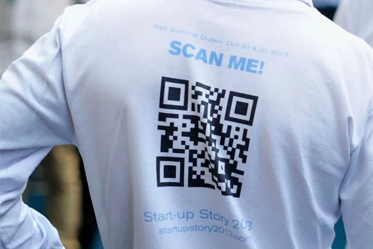 A quick response (QR) code on a delegate's shirt at the Dublin Web Summit in Ireland. (Aidan Crawley / Bloomberg)