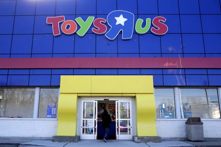 A woman enters a Toys R Us store in Paramus, N.J. Toys R Us CEO David Brandon told employees Wednesday, that the company's plan is to liquidate all of its U.S. stores, according to an audio recording of the meeting obtained by The Associated Press.