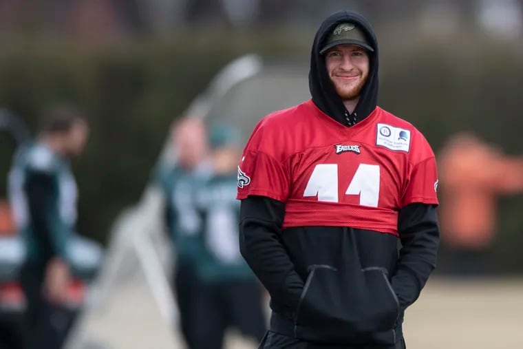Philadelphia Eagles quarterback Carson Wentz watched Thursday's practice from the sidelines at the NovaCare Complex.
