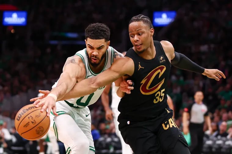 Jayson Tatum #0 of the Boston Celtics and Isaac Okoro #35 of the Cleveland Cavaliers fight for the ball during the third quarter in Game One of the Eastern Conference Second Round Playoffs at TD Garden on May 07, 2024 in Boston, Massachusetts. (Photo by Maddie Meyer/Getty Images)