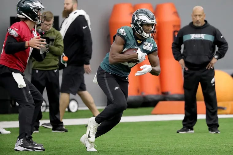 Eagles Josh Adams practices a running play during Eagles practice at the NovaCare Complex in Philadelphia, PA on November 14, 2018. The Eagles face the Saints on November 18. DAVID MAIALETTI / Staff Photographer