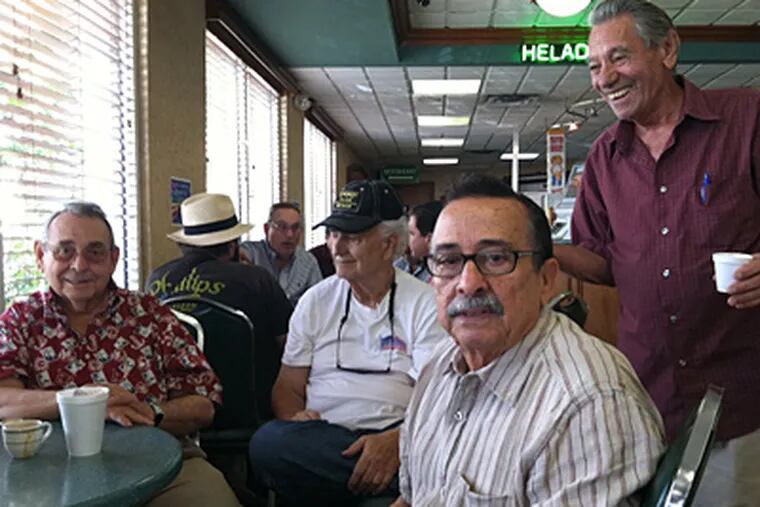 Cuban exile Eddy Hernandez (foreground) cast an early vote in Florida for Mitt Romney but also likes Newt Gingrich. (Melissa Dribben / Staff)