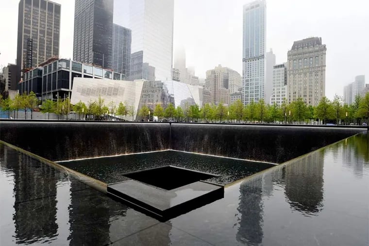 A view of the National September 11 Memorial Museum with the north reflecting pool in foreground. The museum will require about $60 million annually to operate. (Justin Lane/Pool/Sipa USA/MCT)