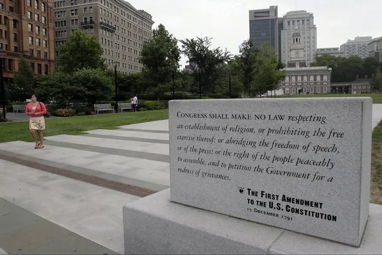 A copy of the First Amendment of the United States Constitution sits near Independence Park.