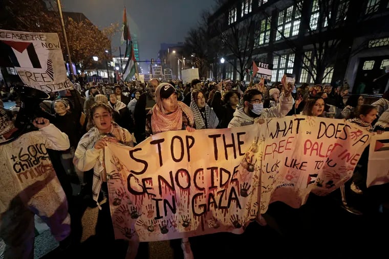 Protesters march in Philadelphia on Sunday, demanding a cease-fire in Gaza.