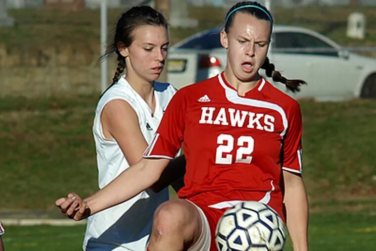 Haddon Township's Patrice Maro handles the ball in the second half. (April Saul / Staff Photographer)