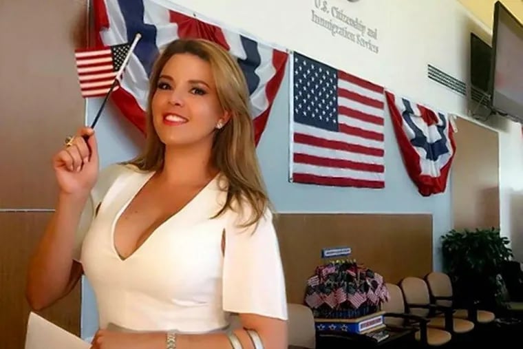 Alicia Machado, Miss Universe 1996, poses for a photo after being sworn in as a U.S. citizen Aug. 19, 2016.