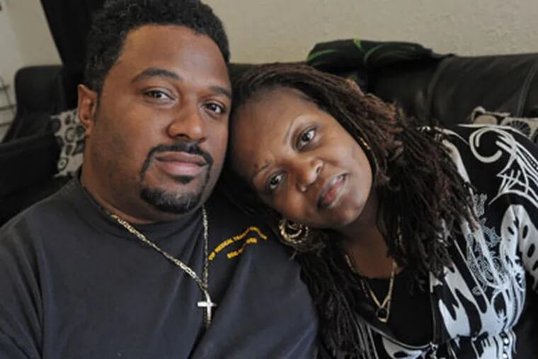 At her Camden home, Crystal Perkins, who needs a kidney transplant; also in photo is her husband, Johnnie Perkins.   Oct. 11, 2012.    APRIL SAUL / Staff Photographer