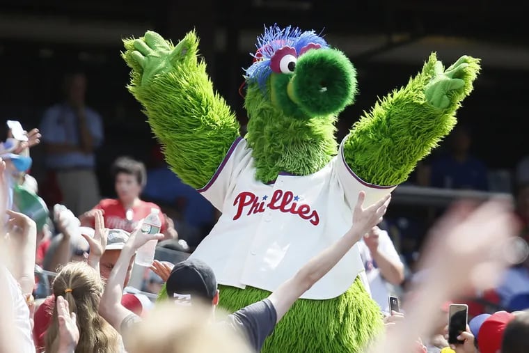 The Phillie Phanatic dances to YMCA with Phillies fans  at Citizens Bank Park.