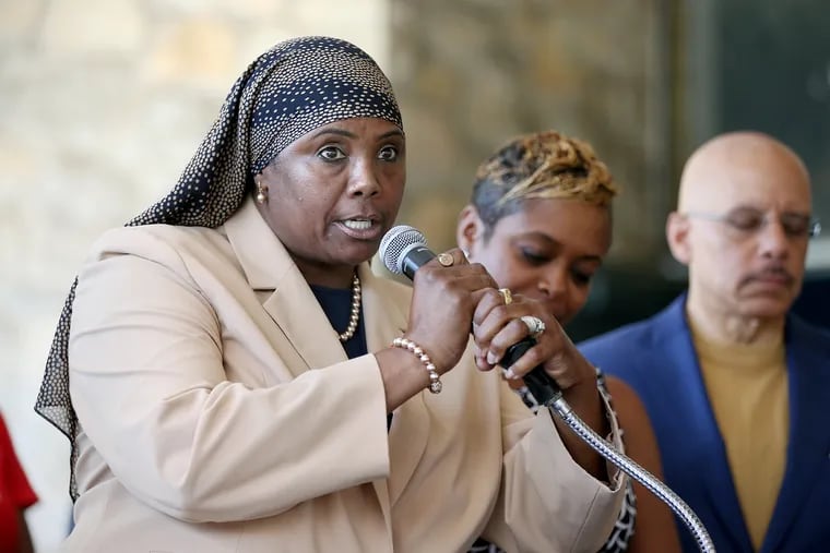 Former State Rep. Movita Johnson-Harrell (D., 190th) speaks during a July news conference. She resigned from office earlier this month after being accused of stealing more than $500,000 from a nonprofit she founded. She is expected to plead guilty to some of the criminal charged filed against her by the Pennsylvania Office of Attorney General.