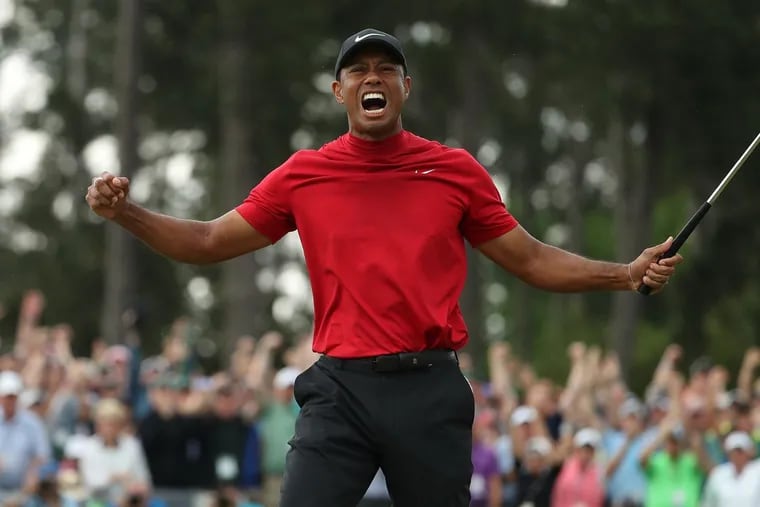 Tiger Woods celebrating after winning the Masters.