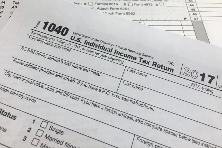 An IRS 1040 form, U.S. Individual Income Tax Return.