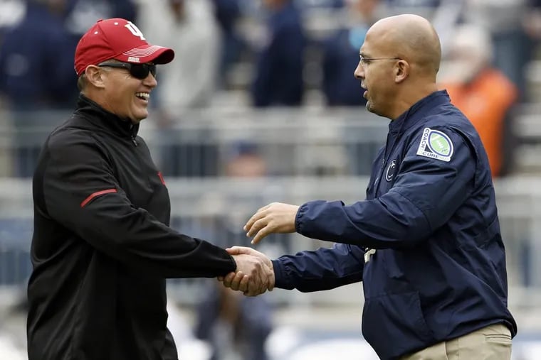 Penn State head coach James Franklin, right, shakes hands with Indiana head coach Tom Allen, left, during warmups before their teams’ game last Saturday.