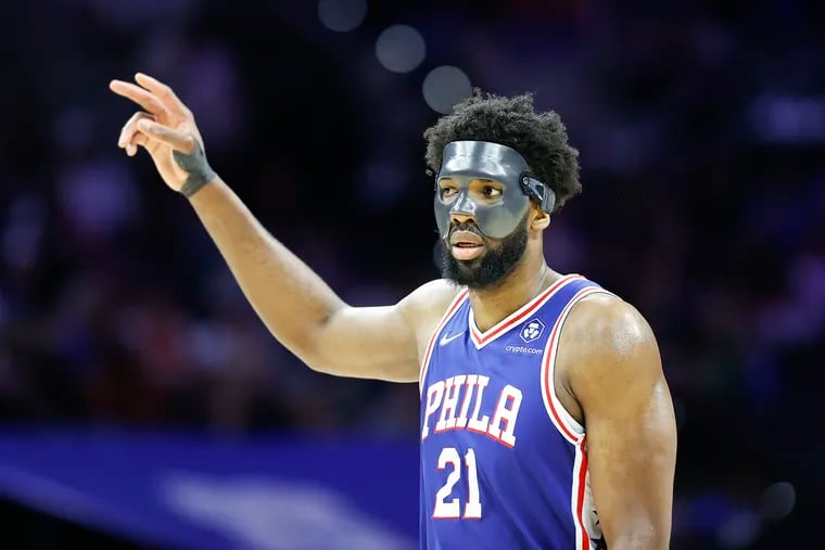 Sixers center Joel Embiid raises his fingers against the Miami Heat during game six of the second-round Eastern Conference playoffs on Thursday, May 12, 2022 in Philadelphia.