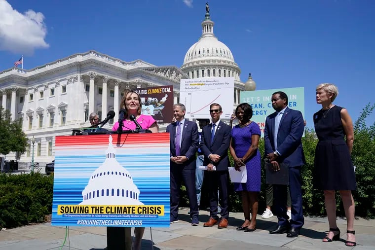 Rep. Kathy Castor (D., Fla.) (left) discusses the climate crisis and the Inflation Reduction Act during a news conference on Capitol Hill in Washington, Friday, Aug. 12, 2022.