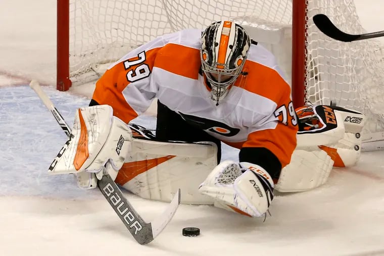Philadelphia Flyers goaltender Carter Hart (79) makes a second period save against the Florida Panthers in an NHL hockey game, Saturday Dec. 29, 2018, in Sunrise, Fla. (AP Photo/Joe Skipper)