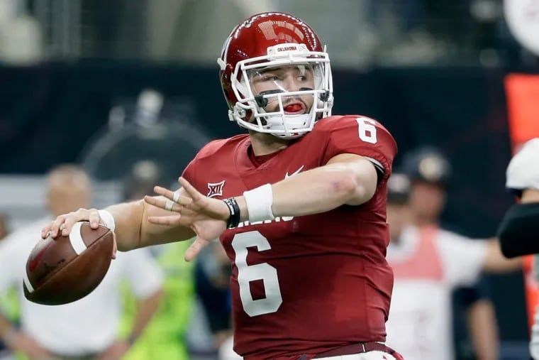 Oklahoma quarterback Baker Mayfield throwing a pass during the Big 12 Conference championship game in December.