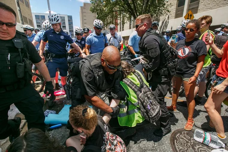 Philadelphia police raided and destroyed an encampment of protesters outside the Immigration and Customs Enforcement office in Center City on Thursday afternoon, July 5, 2018.