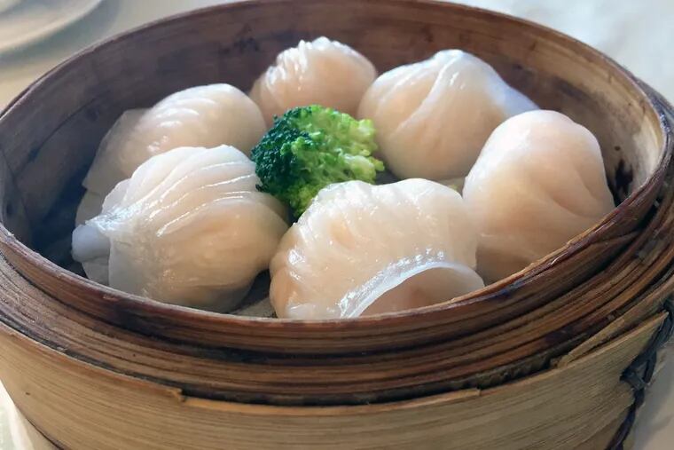 Har gow (shrimp dumplings) at Peninsula Seafood Restaurant in Vancouver, Canada, are presented in a bamboo steamer.