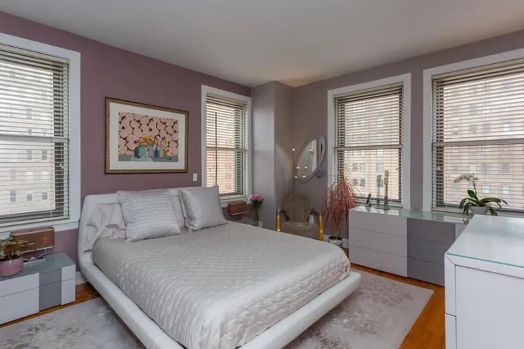 Each room of the two-bedroom, two-bathroom condo has a view, high above Rittenhouse Square.