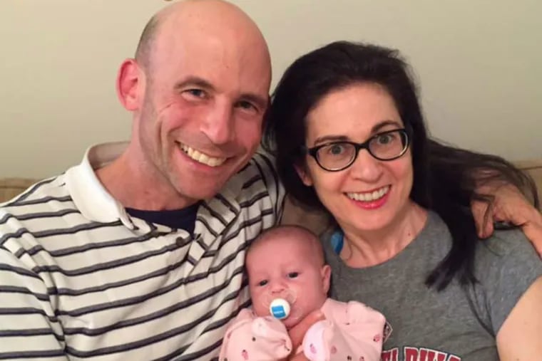 Lisa Yaffe Sprafkin and Neal Sprafkin with baby Sydney.