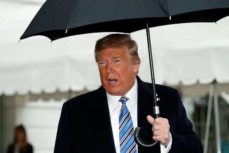 President Donald Trump speaks about the coronavirus as he walks to Marine One to depart the White House, Saturday, March 28, 2020, in Washington. Trump is en route to Norfolk, Va., for the sailing of the USNS Comfort, which is headed to New York.