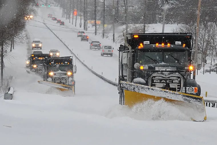 File photo: A PennDot plow train headed south on Route 202 in Birmingham Township  Feb. 13, 2014 as the Philadelphia region got slammed with a Nor'easter snowstorm.  ( CLEM MURRAY / Staff Photographer )