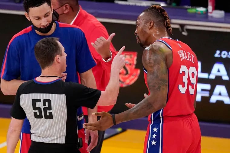 Sixes  center Dwight Howard, right, and point guard Ben Simmons question referee Scott Twardoski on Thursday.