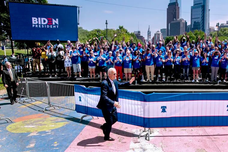 Former vice president and Democratic presidential candidate Joe Biden arrives on Eakins Oval May 18, 2019, headed to the stage for a mid-day rally.