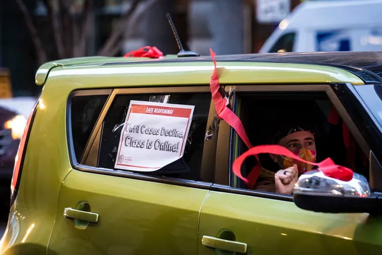 Members of the Chicago Teachers Union and supporters staged a car caravan protest outside City Hall in the Loop last Wednesday.