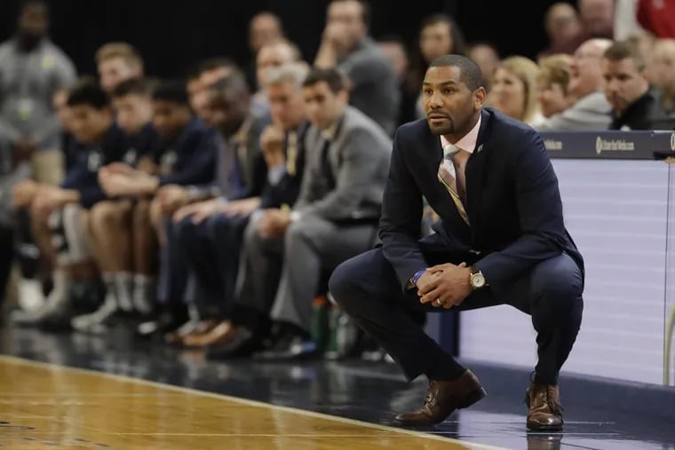 Butler coach LaVall Jordan (right). watching a game against Purdue earlier this month.