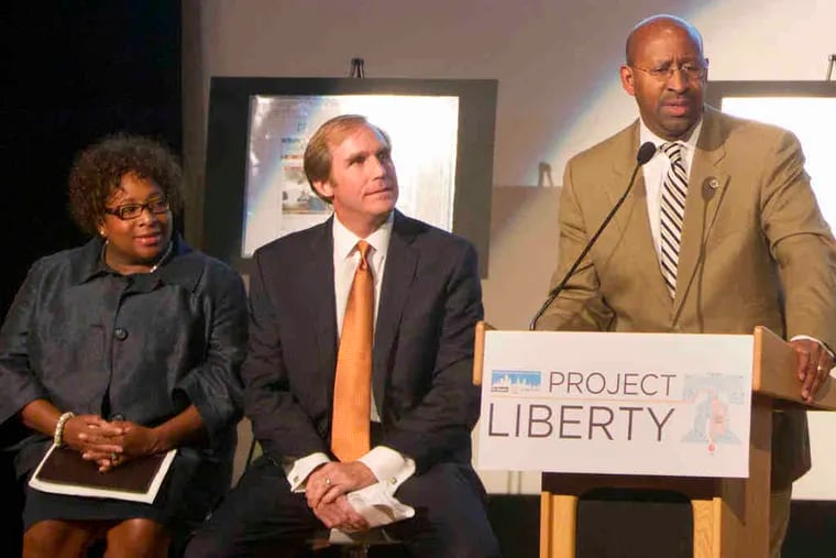 Flanking Gregory J. Osberg at the announcement of Project Liberty and other initiatives are Mayor Nutter and the Knight Foundation's Donna Frisby-Greenwood.