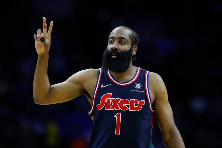 Sixers guard James Harden raises his fingers against the Dallas Mavericks on Friday, March 18, 2022 in Philadelphia.