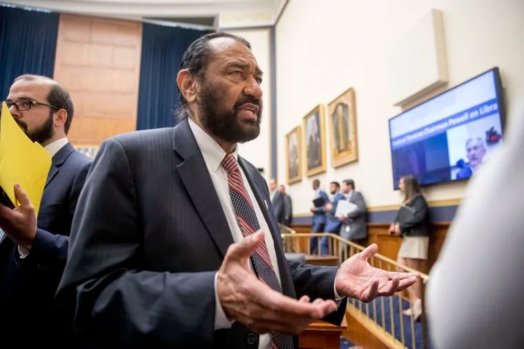 Rep. Al Green, D-Texas, right — who introduced a resolution in the House to impeach President Donald Trump — spoke to visitors during a break from testimony from David Marcus, CEO of Facebook's Calibra digital wallet service, before a House Financial Services Committee hearing on Facebook's proposed cryptocurrency on Capitol Hill in Washington.